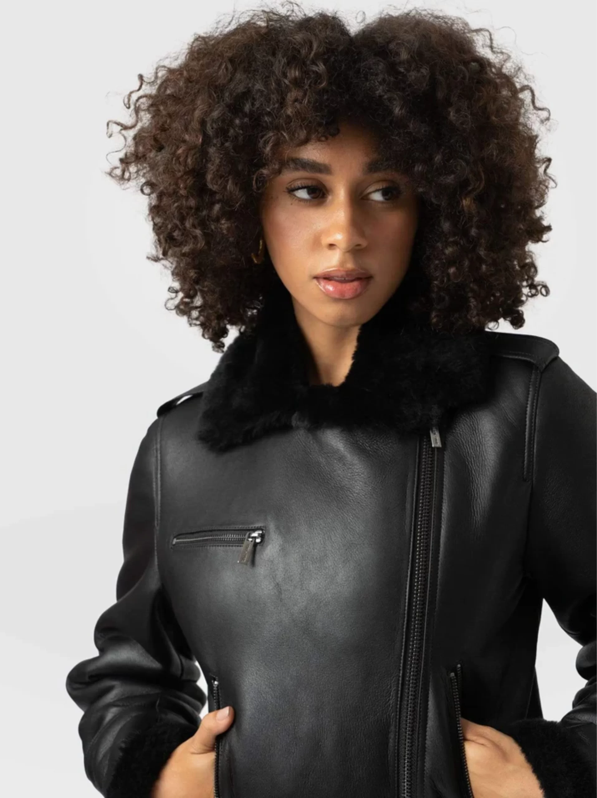 A classic aviator black shearling Leather jacket for women