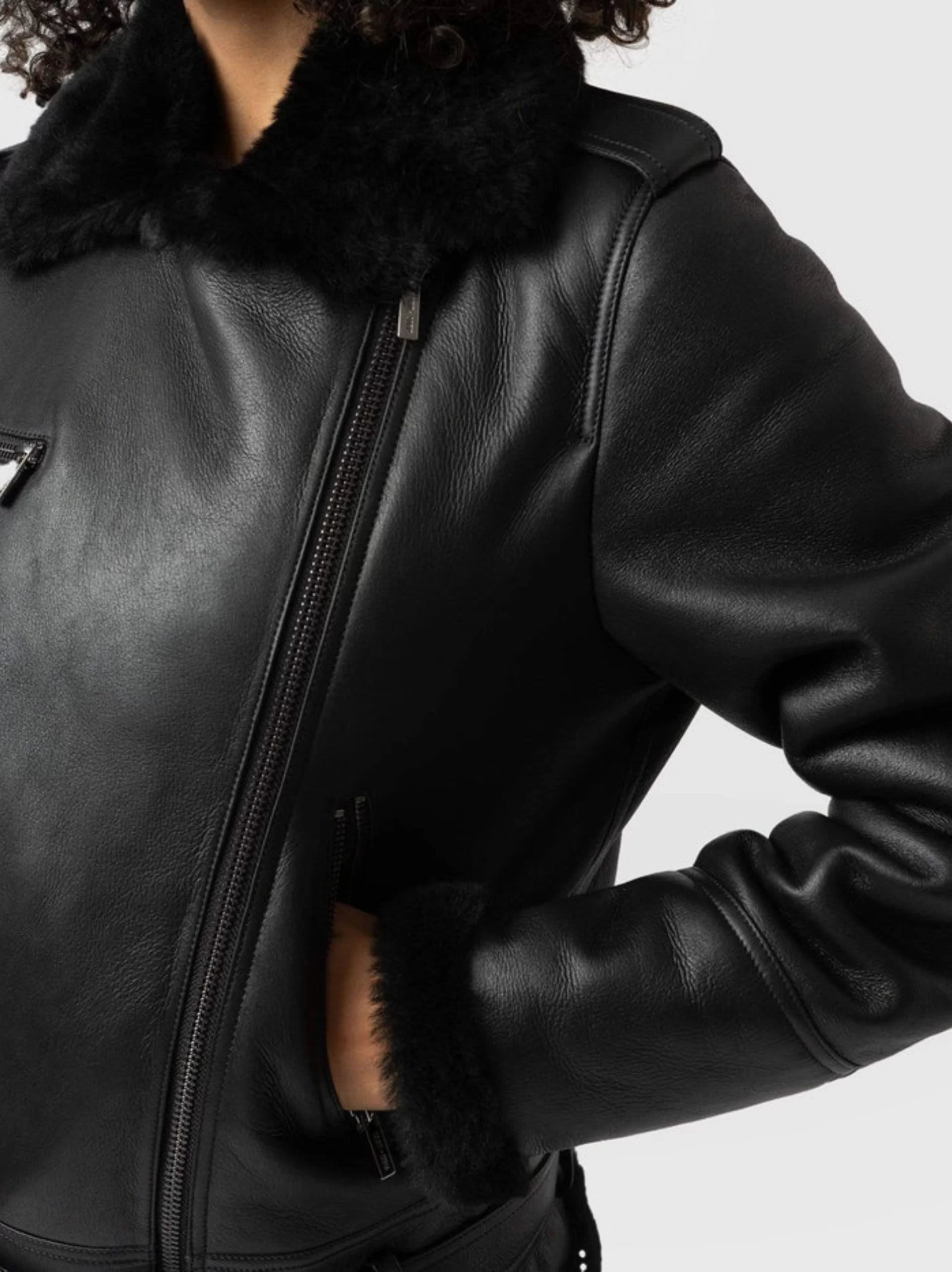 A classic aviator black shearling Leather jacket for women