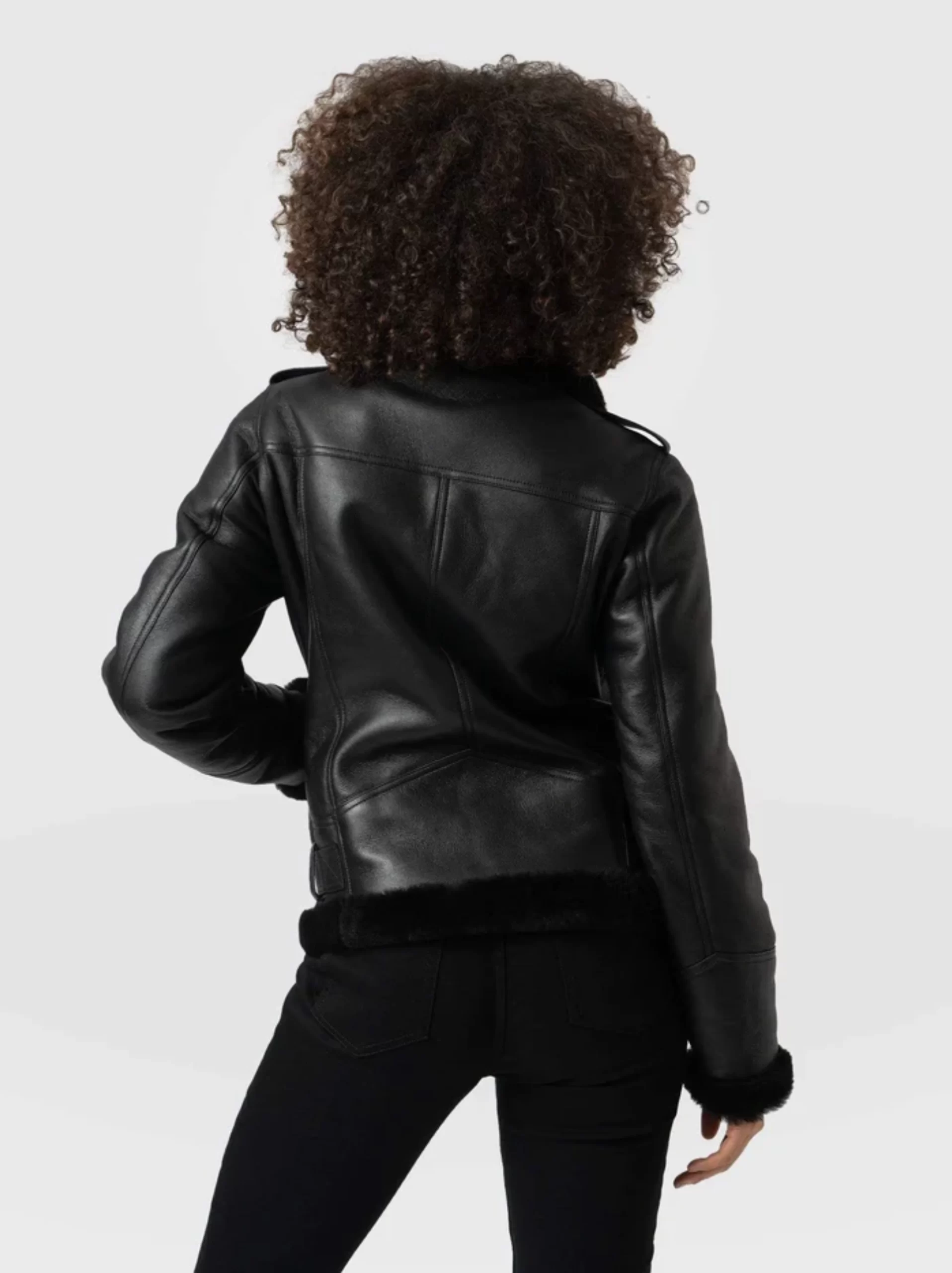A classic aviator black shearling Leather jacket for women