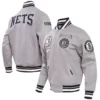 Brooklyn Nets Pro Standard Heather Crest Emblem Full Snap Gray Varsity Jacket - Image 4