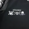 Stussy-x-Kostas-Seremetis-Black-Wool-Leather-Varsity-Jacket-leather moto