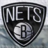 Brooklyn-Nets-The-Ambassador-Satin-Varsity-Jacket-Black